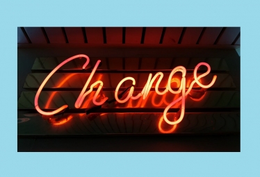 Image of a Neon Light saying 'Change'